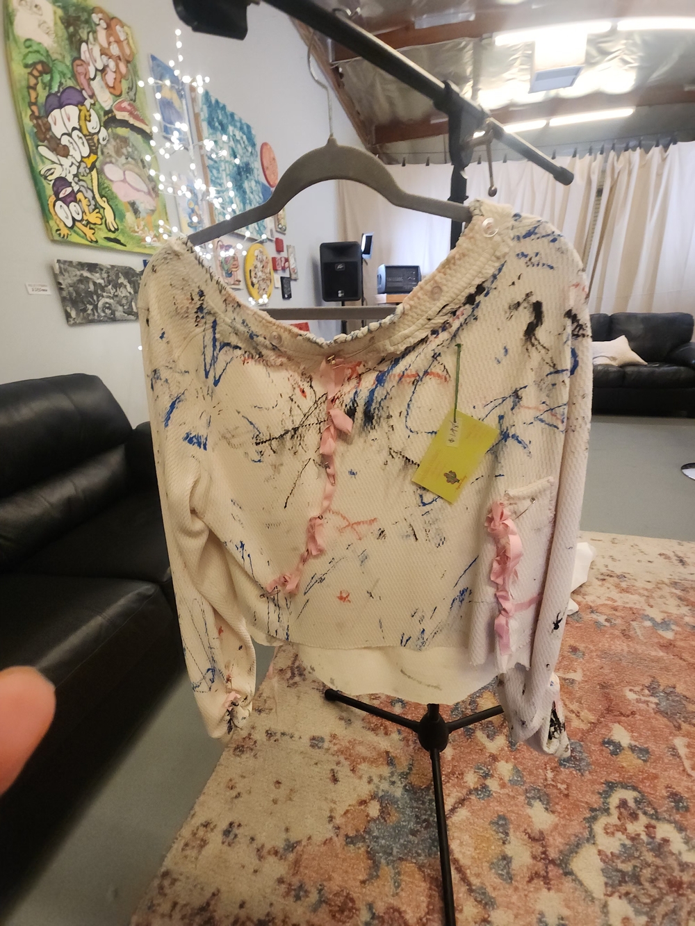 Cream Paint-Splatter Knit Sweatshirt with Pink Ribbon Accents